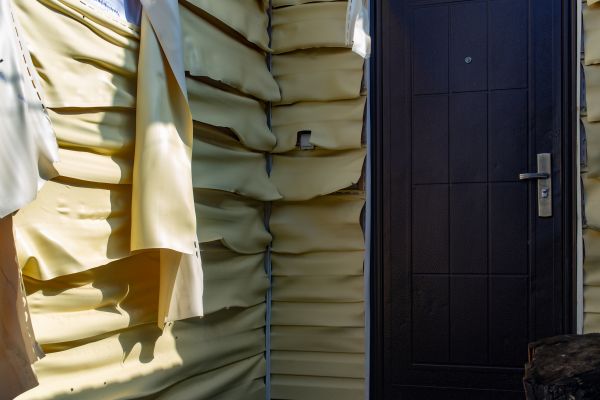 Cost of Melted Siding Replacement in Evans