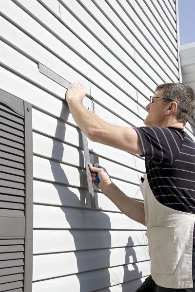 Cost of Vinyl Siding Service in Evans